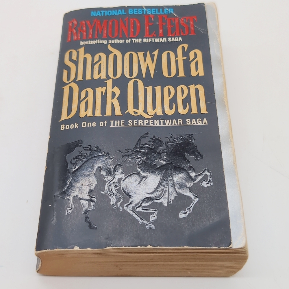 Shadow of a Dark Queen by Raymond E. Feist - Black & Gold Paperback